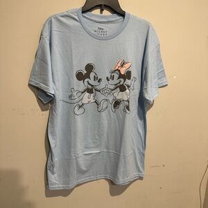 New Juniors Mickey Mouse’s and Minnie Holding  hands.